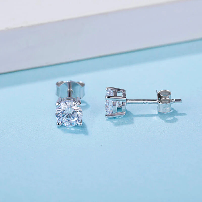 Belamol® Solitaire Round Moissanite Four Prong Earrings